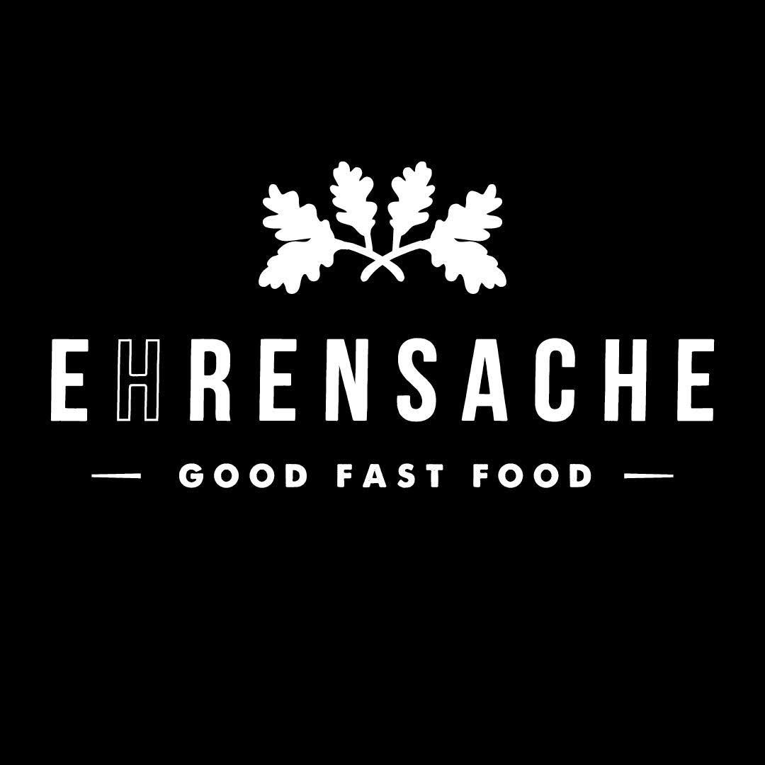 Schwarzes Ehrensache Logo mit Eichenlaub und Good Fast Food Schriftzug